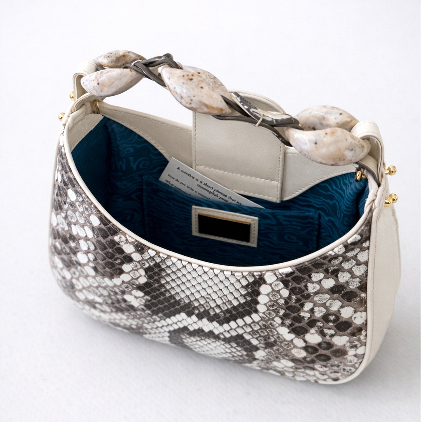 
                  
                    All That Bag - Ivory Python
                  
                